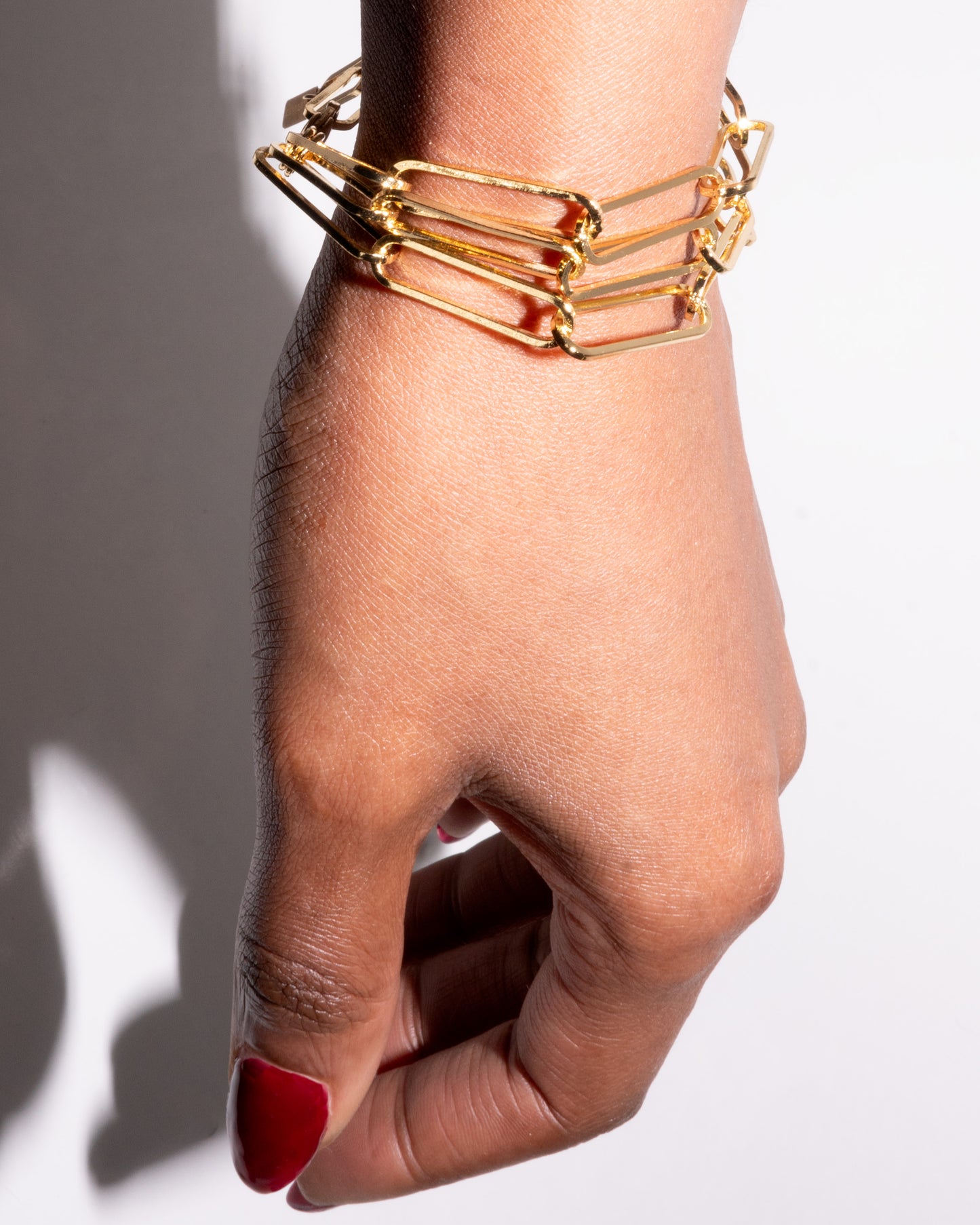 14k gold-filled paperclip chain bracelet, triple strand link design, made in New York by Studio Baloge, luxury statement jewelry for women