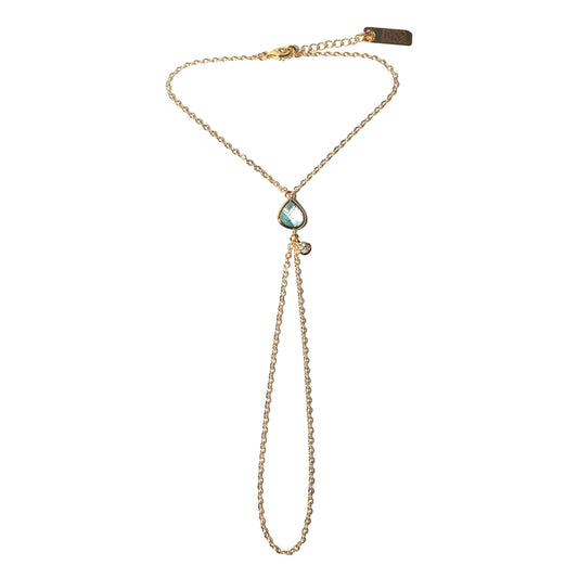 Point Hand Harness on white background featuring a single aquamarine gemstone drop