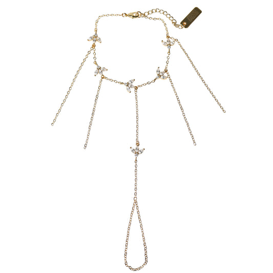 Gold nhand harness with gemstones pendants on a white background