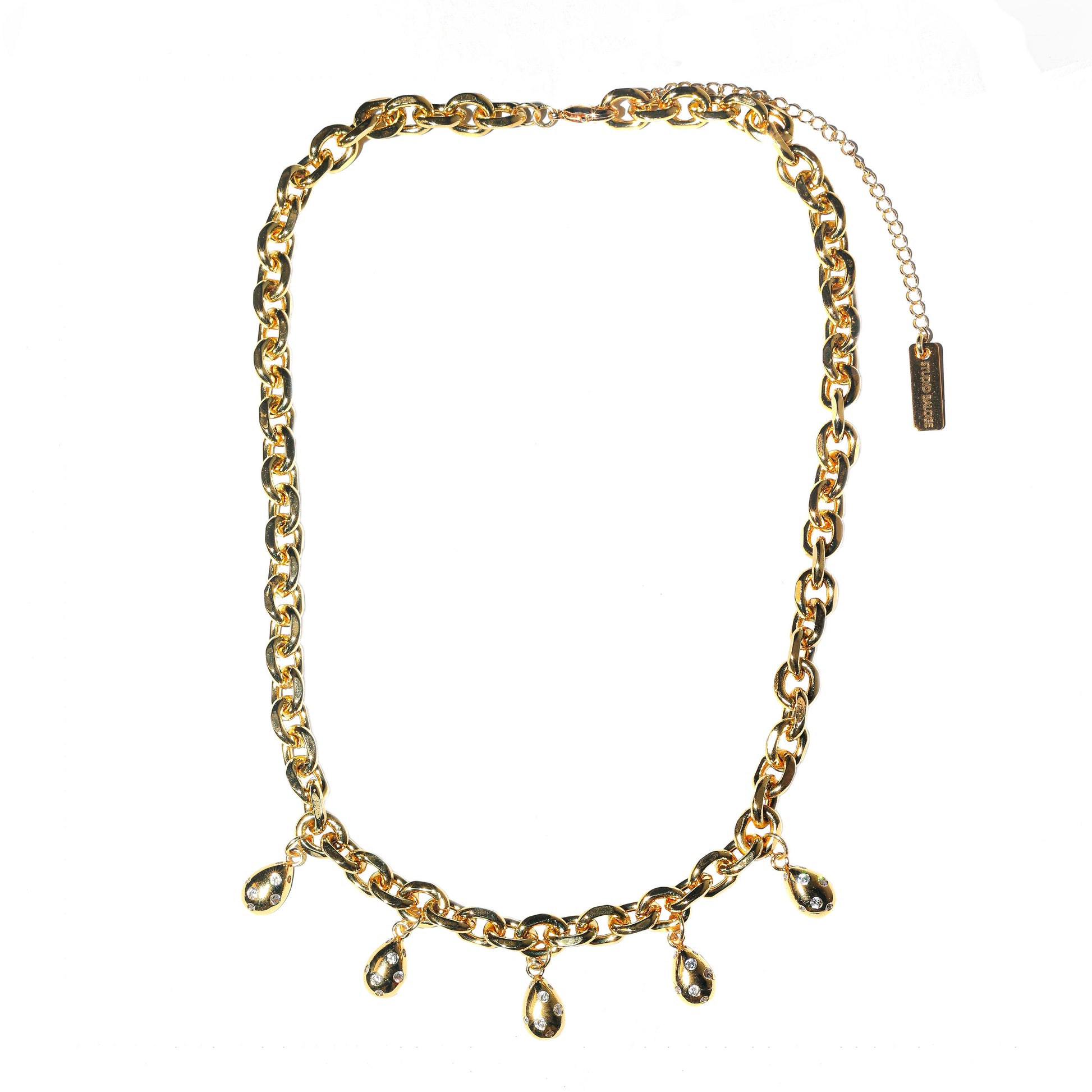 Gold chain necklace with teardrop pendants on a white background