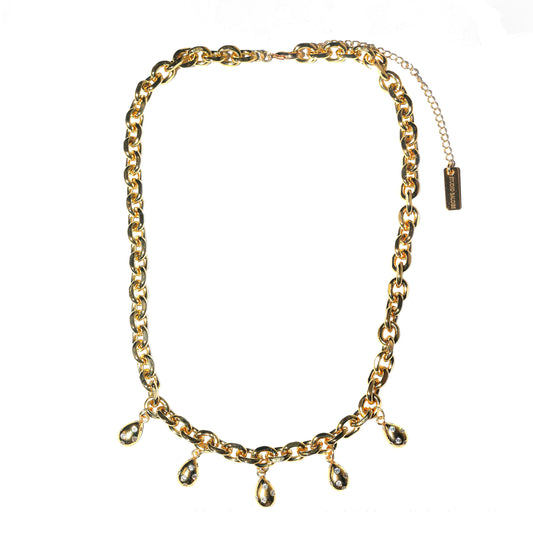 Gold chain necklace with teardrop pendants on a white background