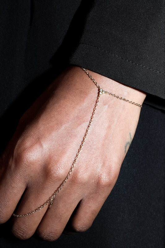 Signal Hand Harness on hand with delicate gold-filled drop chain and cubic zirconia details