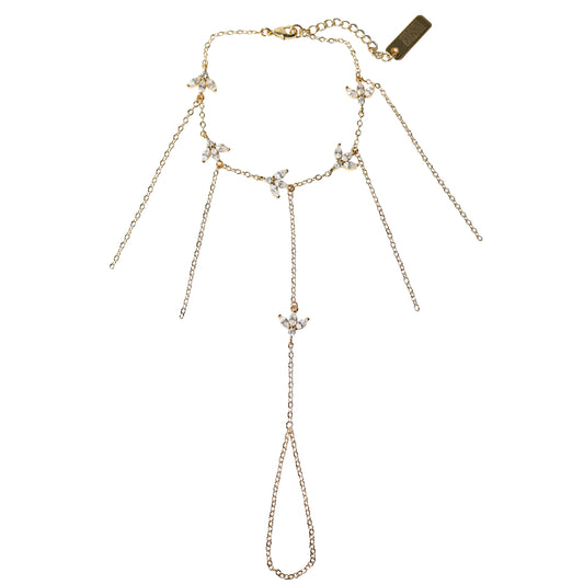 Gold nhand harness with gemstones pendants on a white background