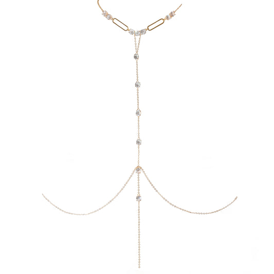 A delicate gold-toned Y-shaped chain body chain with clear faceted gemstones, displayed on a solid white background.